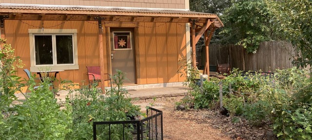 Custom Built Tiny House in an organic backyard garden in Eugene