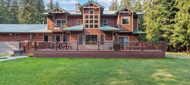 Expansive Riverfront Lodge with Dock, Game Room, Bar & Spacious Deck! in Clark Fork
