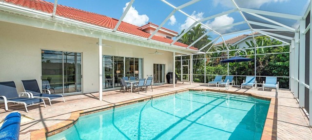 Luxury Crown Pointe pool & lake view home minutes to beaches & Old Naples in Naples