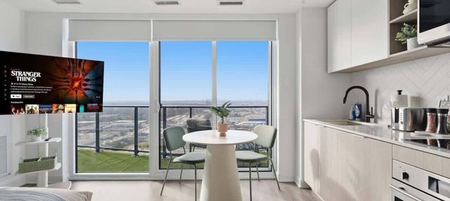 Modern Etobicoke Studio Sleek Queensway Retreat in Toronto