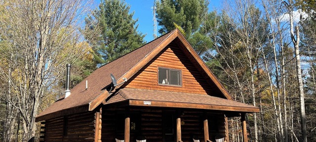 Rustic Forest Getaway has the comforts of home surrounded by woods and water. in Crystal Falls