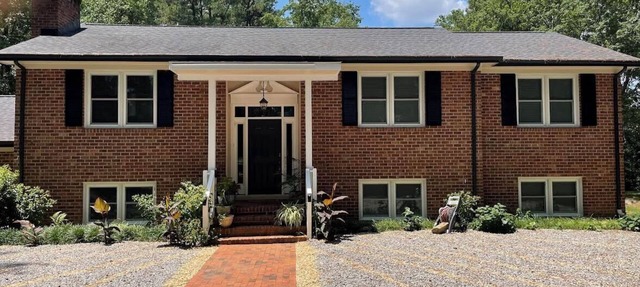 Top-level of a modern split-level home. in Fuquay-Varina