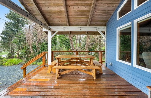 Rockaway Beach Cabin | Rustic waterfront woodland lodge w/impressive lake views from patio