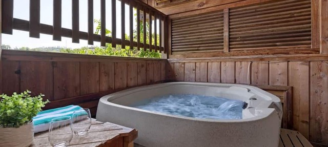 View Location Studio Log Cabin Hot Tub Fireplace in Pigeon Forge